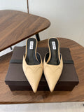 ALAIA 26S HEELED MULES 50 MM IN WARM BEIGE FABRIC