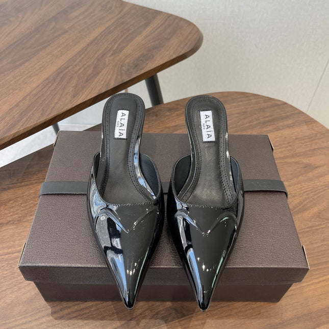 ALAIA 26S HEELED MULES 50 MM IN BLACK GLOSSY CALFSKIN