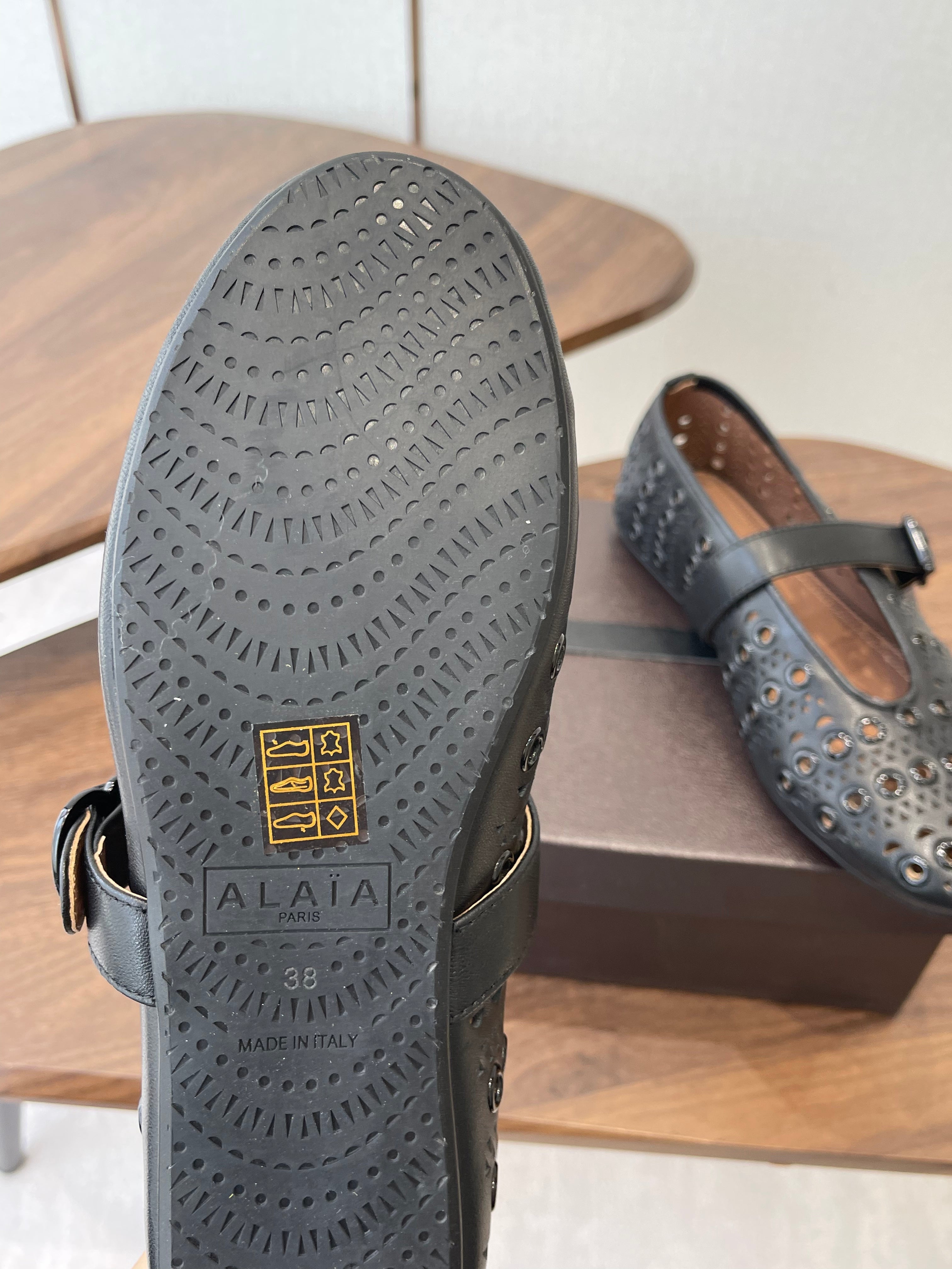 ALAIA 26S MARY JANE FLATS IN BLACK LAMBSKIN
