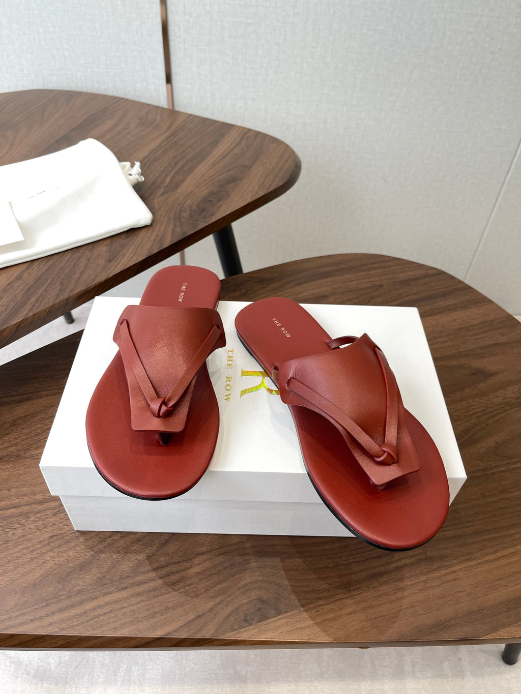 THE ROW 26S T STRAP THONG SANDALS IN RUST RED CALFSKIN