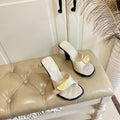 BURBERRY 26S HEELED SANDALS 100 MM IN CREAM WHITE CALFSKIN