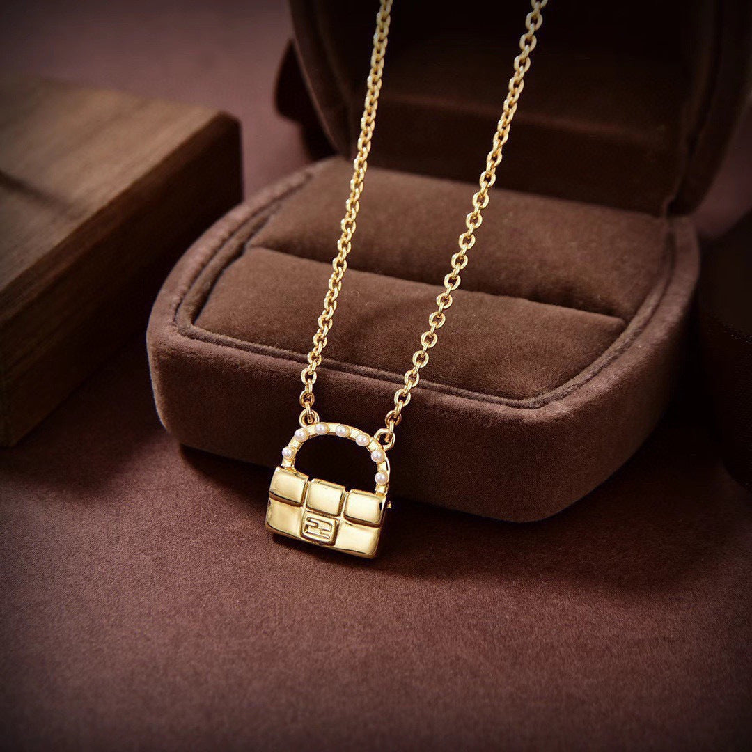 FENDI 26S BAG CHARM PENDANT NECKLACE IN GOLD TONE METAL 625602