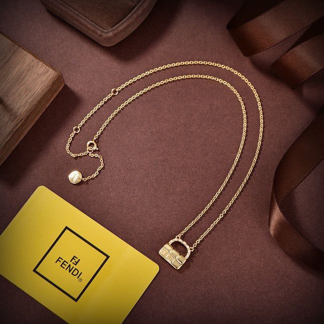 FENDI 26S BAG CHARM PENDANT NECKLACE IN GOLD TONE METAL 625602