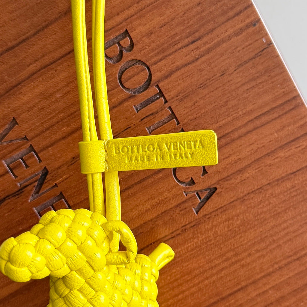 BOTTEGA VENETA 25S DOG CHARM IN LEMON YELLOW CALFSKIN