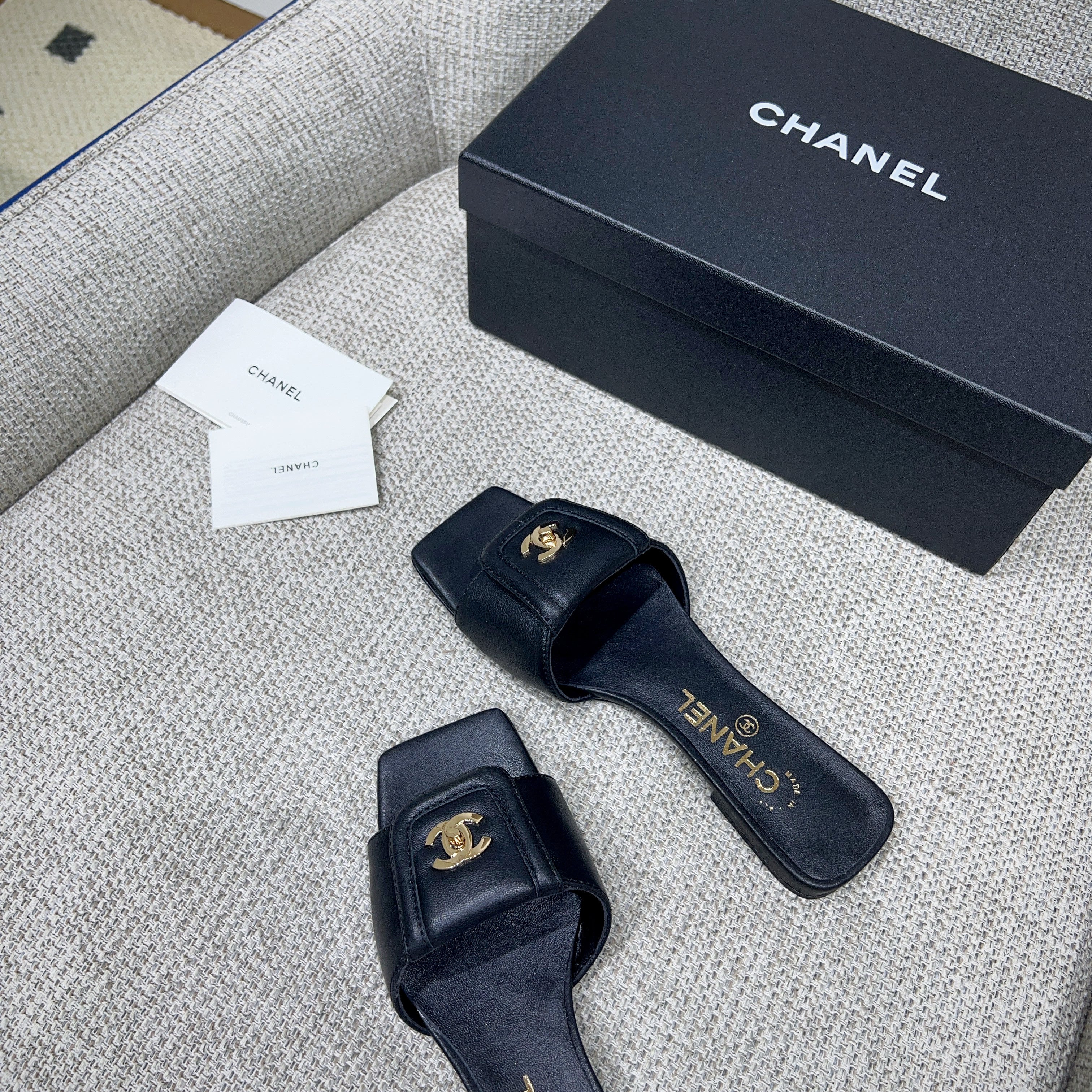 CHANEL 26S FLAT SLIDES IN BLACK LAMBSKIN