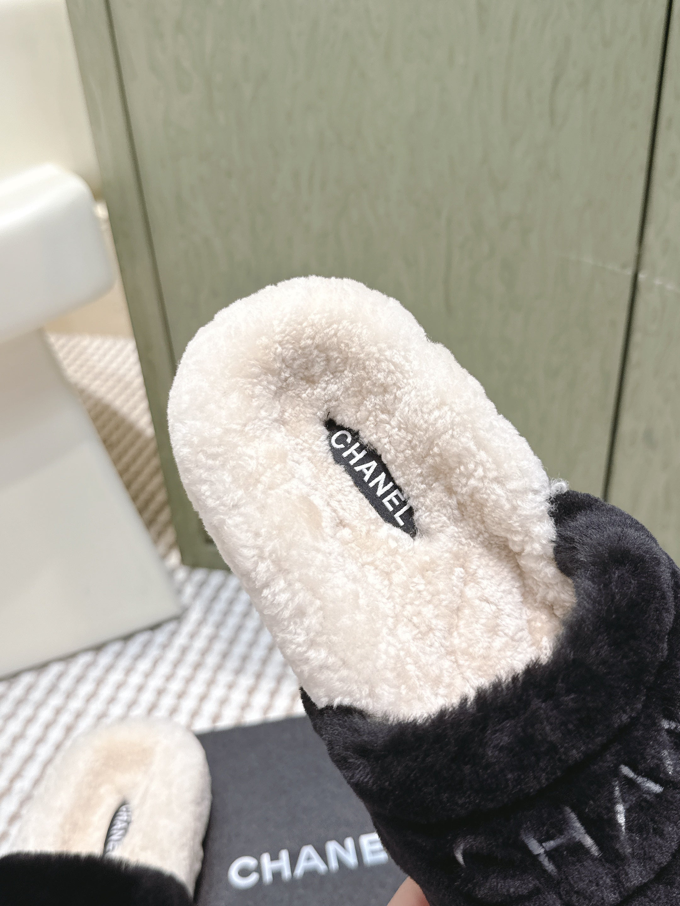 CHANEL 25S FLUFFY SLIDERS IN BEIGE AND BLACK