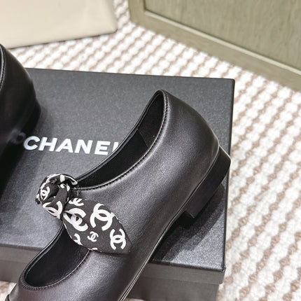 CHANEL 25S MARY JANES IN BLACK SHEARLING AND GROS GRAIN