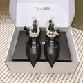 CHANEL 25S ESPADRILLE FLATS IN BLACK CALFSKIN WITH PEARL STRAP