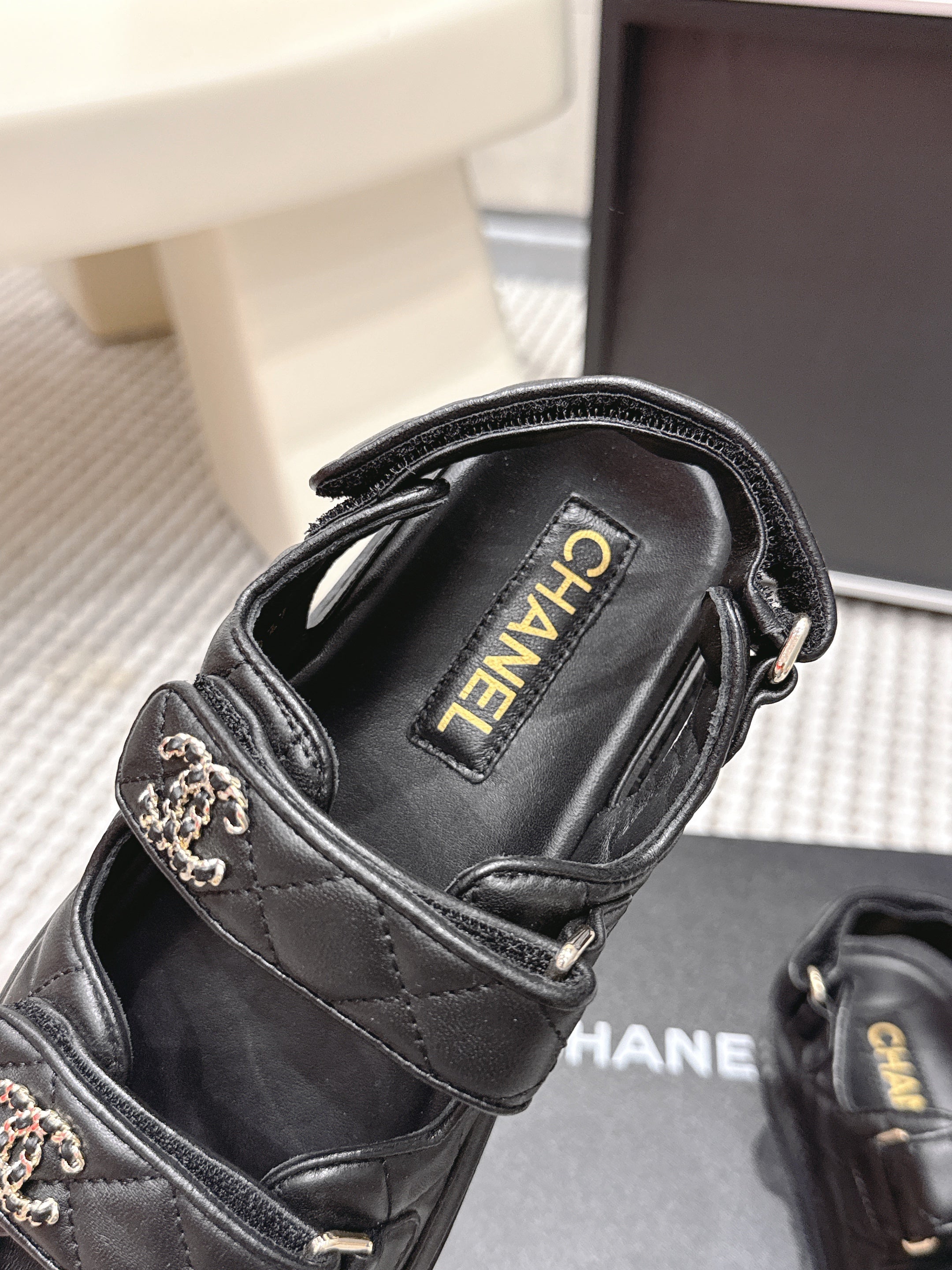 CHANEL 26S QUILTED DAD SANDALS IN BLACK CALFSKIN