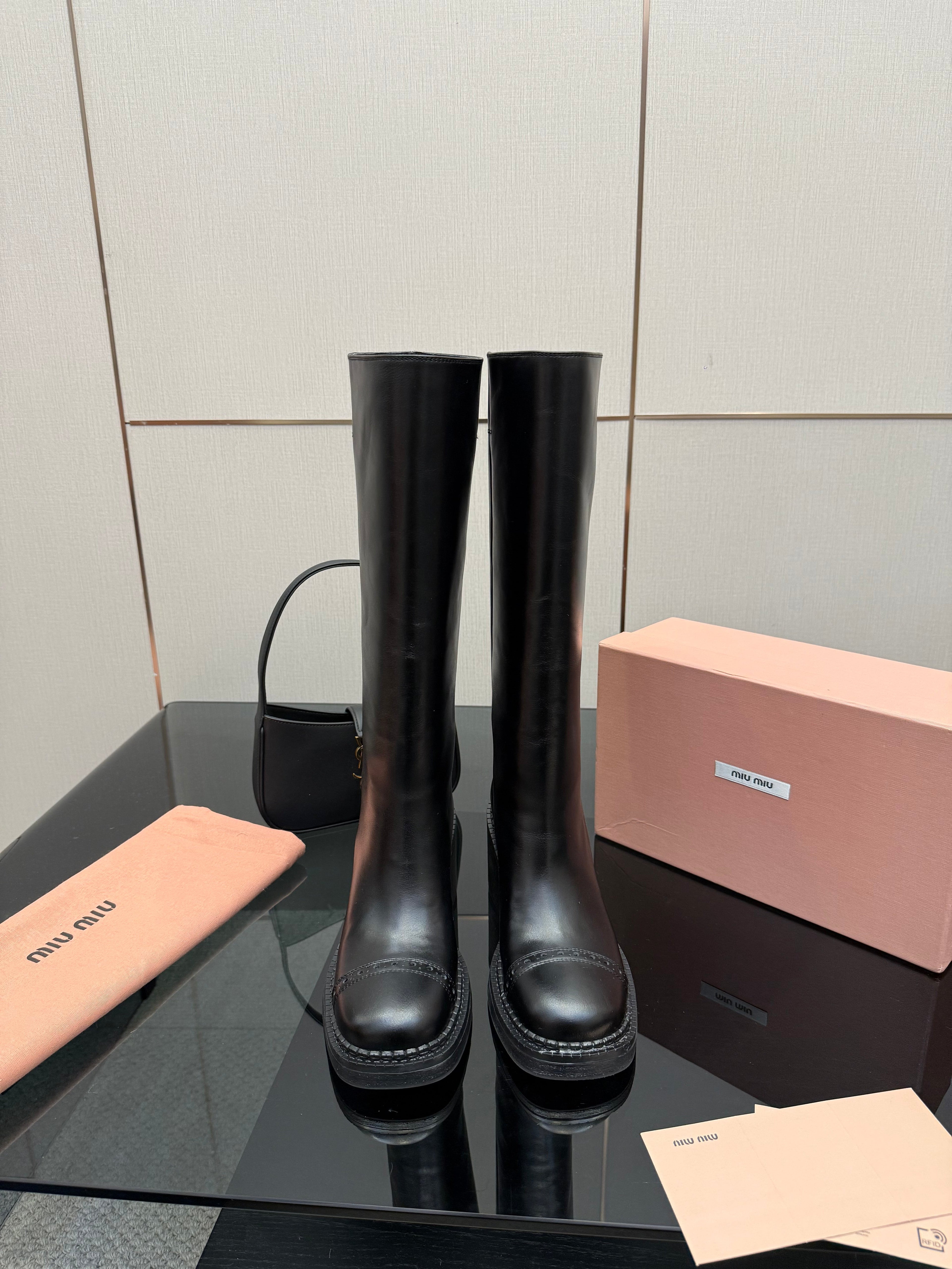 MIUMIU 25S KNEE-HIGH BOOTS IN BLACK CALFSKIN