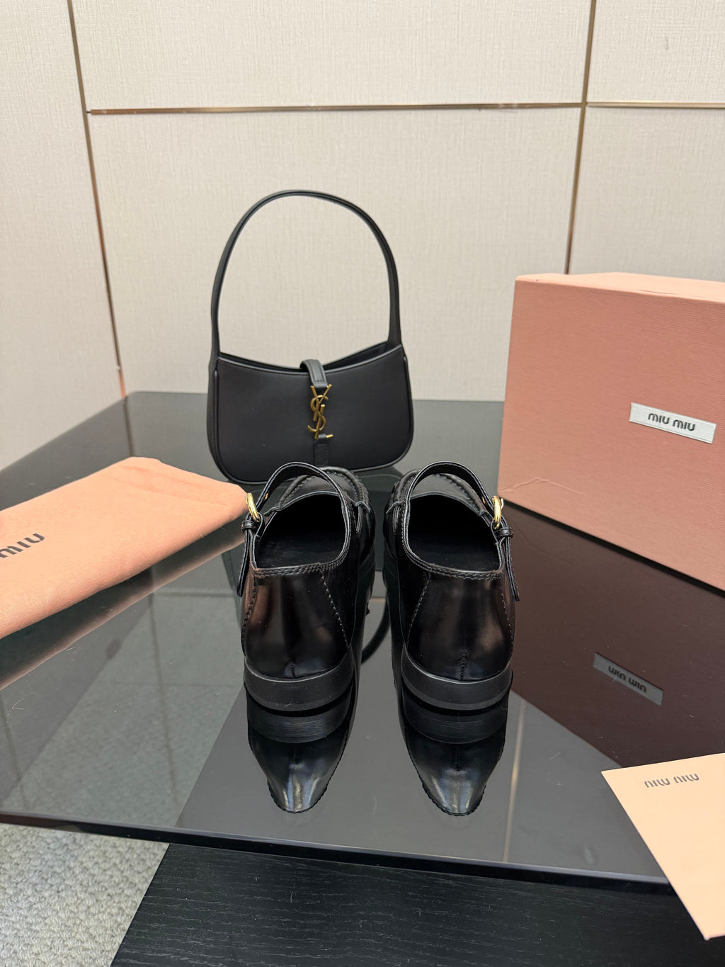 MIUMIU 25S LOAFERS WITH STRAP IN BLACK LAMBSKIN