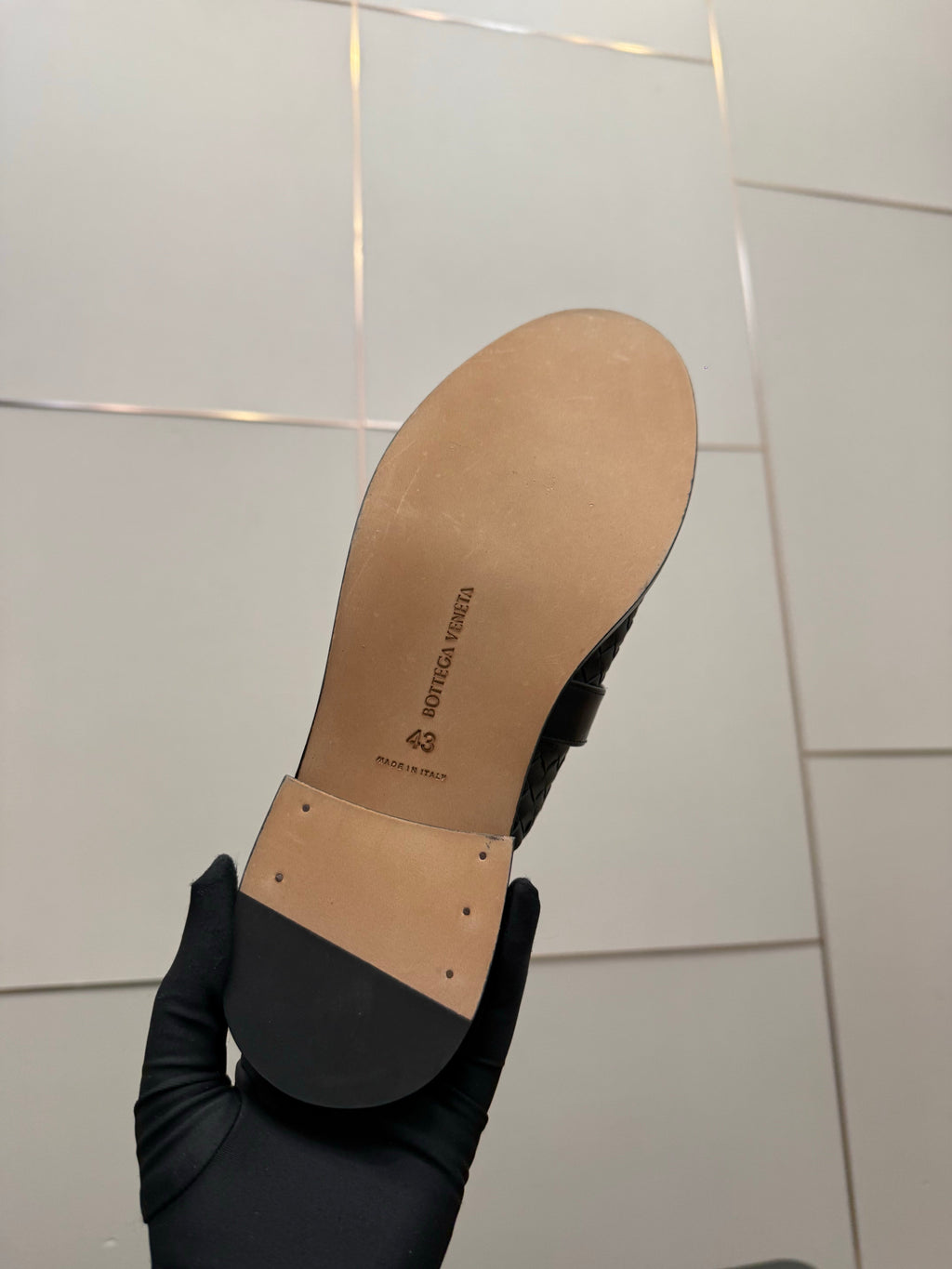 BOTTEGA VENETA 26S BACKLESS LOAFERS IN BLACK TECHNICAL WOVEN CALFSKIN