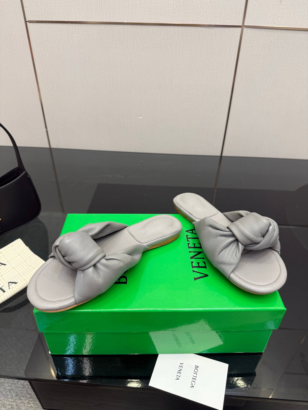 BOTTEGA VENETA 26S SLIDE SANDALS IN DARK GREY LAMBSKIN