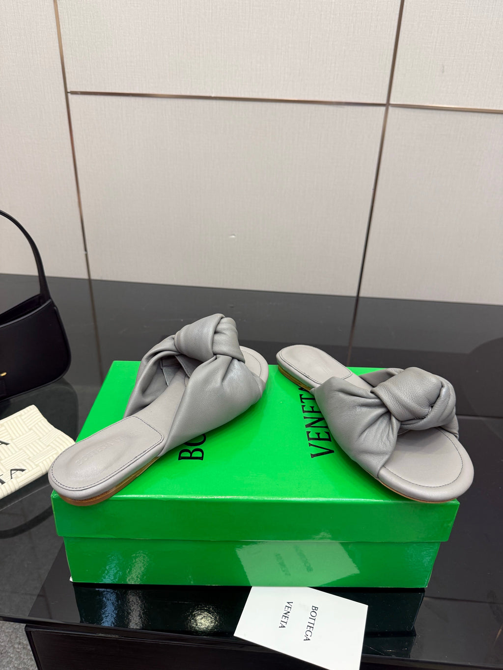 BOTTEGA VENETA 26S SLIDE SANDALS IN DARK GREY LAMBSKIN