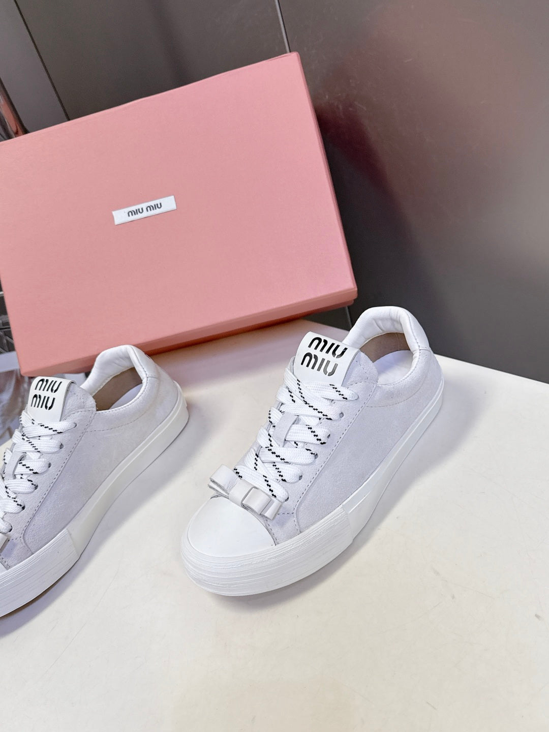 MIUMIU 25S SNEAKERS IN WHITE SUEDE