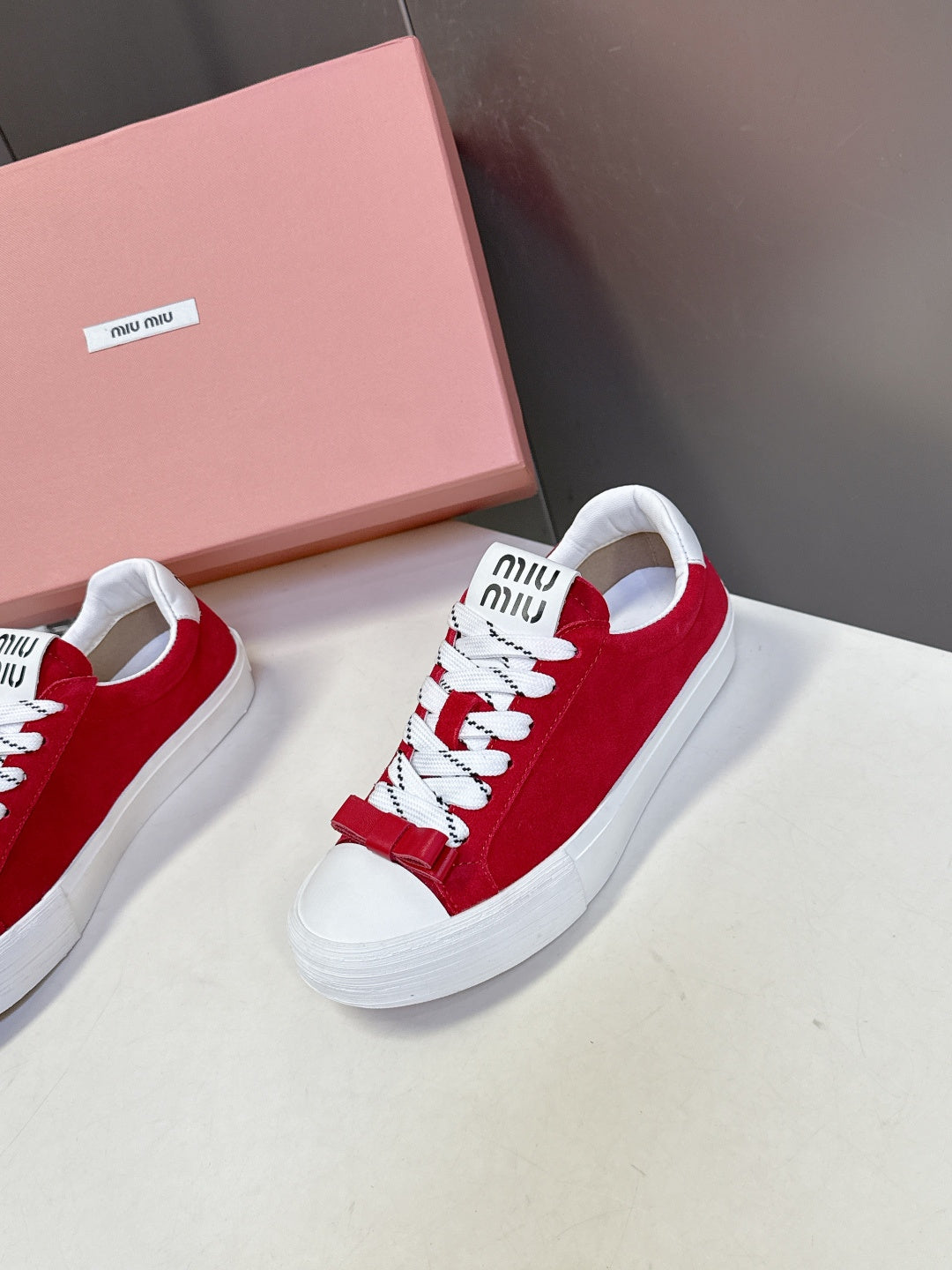 MIUMIU 25S SNEAKERS IN DARK RED SUEDE