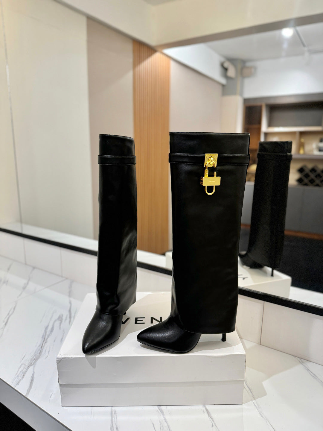 SHARK LOCK BOOTS IN BLACK CALFSKIN GOLD HARDWARE