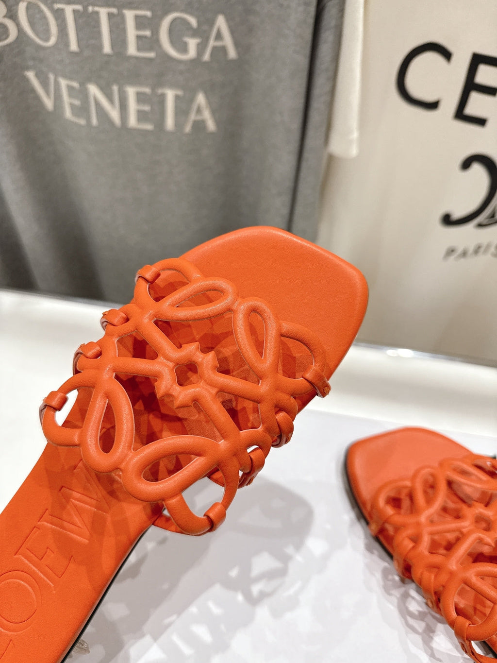 LOEWE 26S PETAL ANAGRAM SLIDE IN BURNT ORANGE CALFSKIN