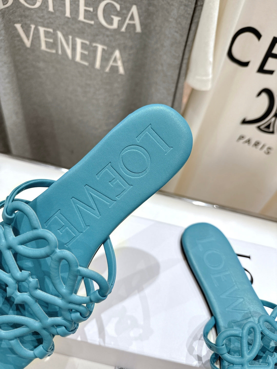 LOEWE 26S PETAL ANAGRAM SLIDE IN TEAL BLUE CALFSKIN