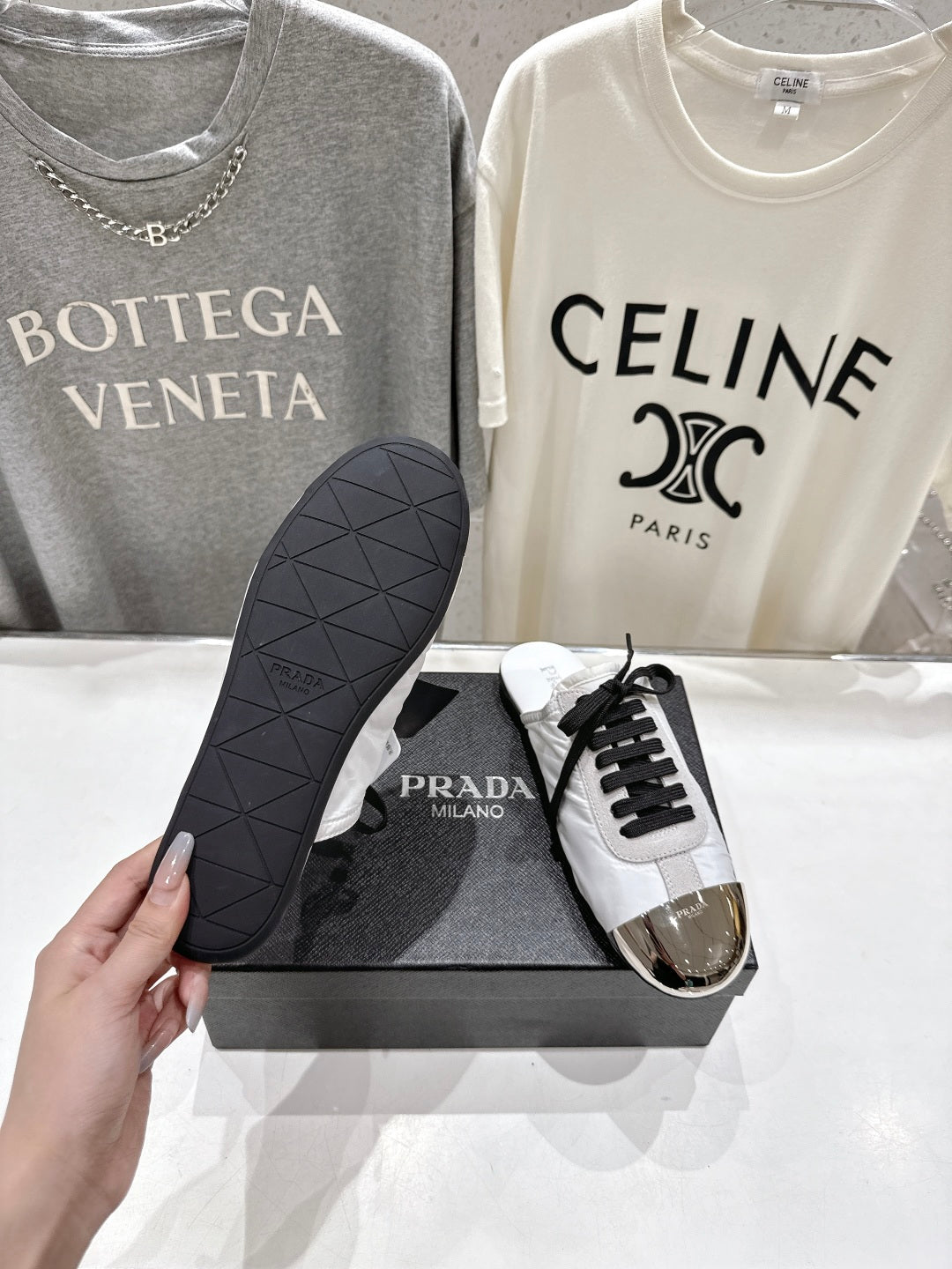 PRADA 25S MULES IN WHITE WITH METAL TOECAP