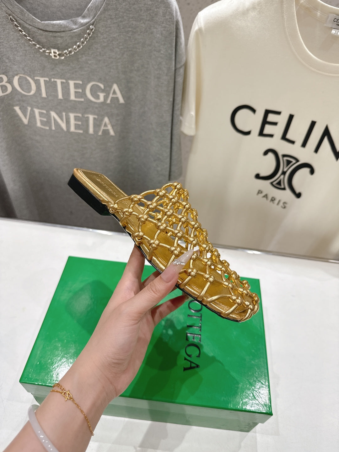 BOTTEGA VENETA 26S WOVEN MULES IN GOLD LAMBSKIN