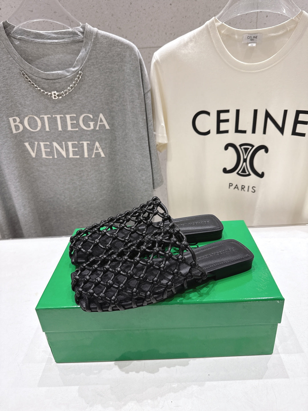 BOTTEGA VENETA 26S WOVEN MULES IN BLACK LAMBSKIN