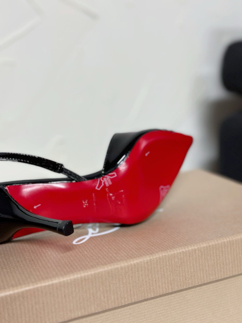 TRANSPARENT PANEL SLING BACK PUMPS IN BLACK PATENT CALFSKIN