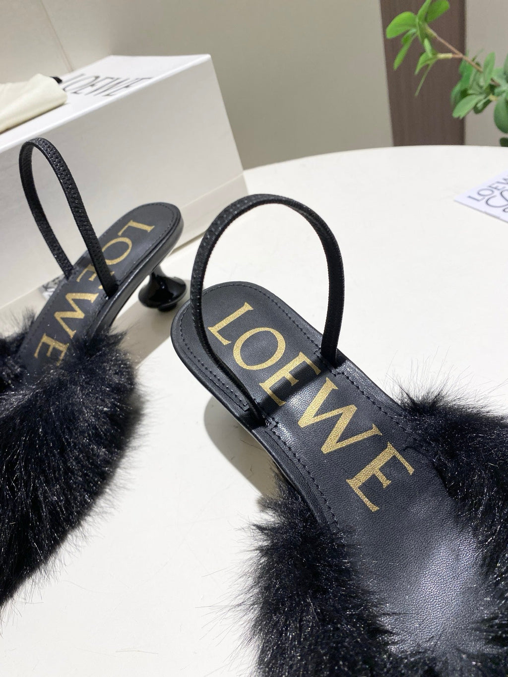 LOEWE 26S OPEN-BACK HIGH HEELS 60MM IN BLACK CALFSKIN WITH FUR