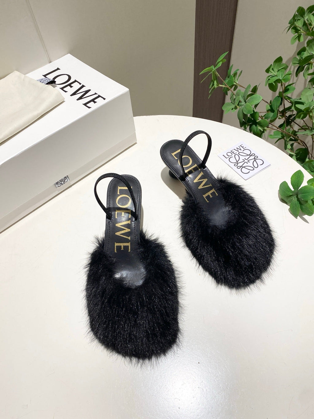 LOEWE 26S OPEN-BACK HIGH HEELS 60MM IN BLACK CALFSKIN WITH FUR