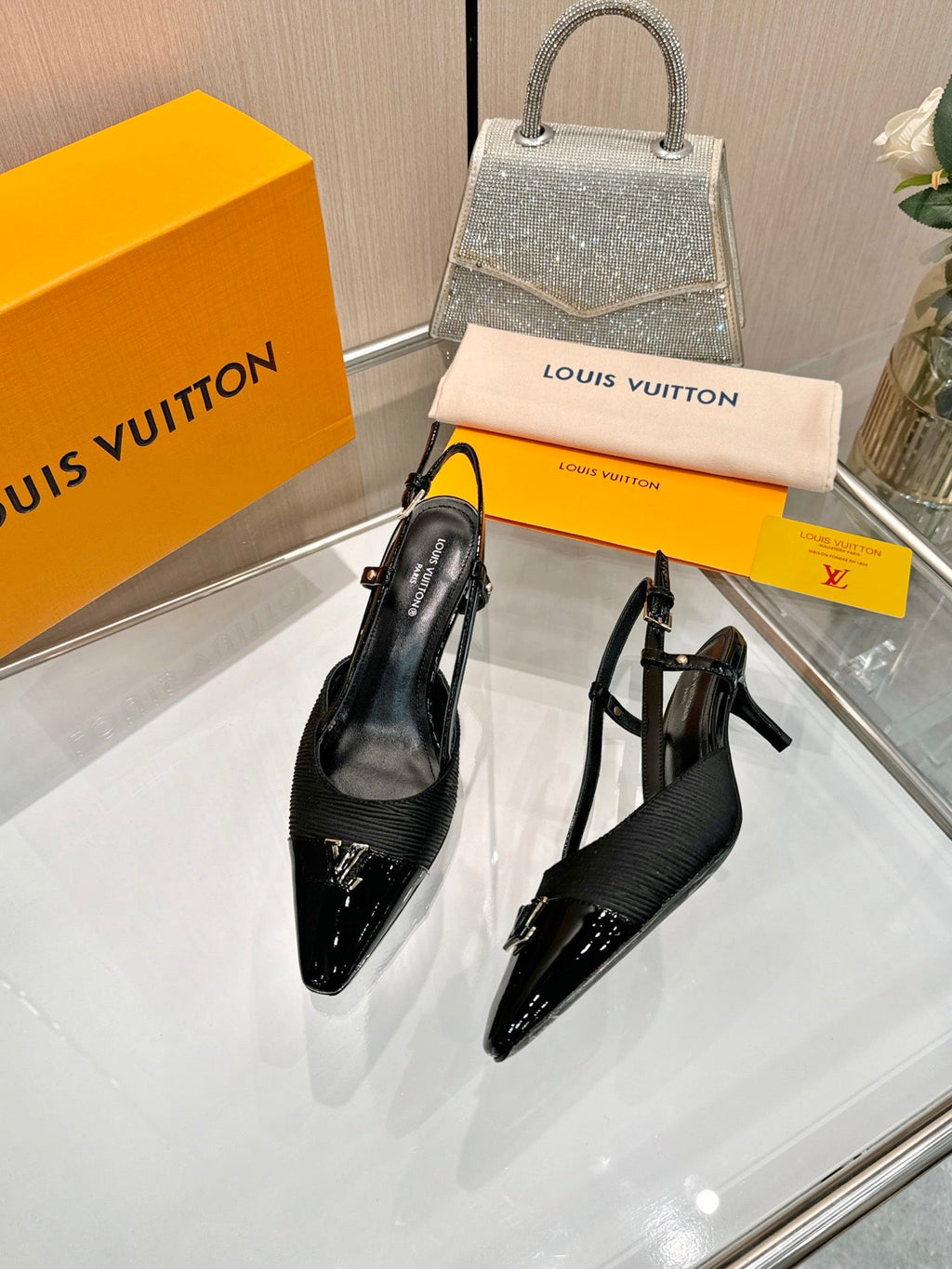 LV 26S SLINGBACK PUMPS 55 MM IN BLACK FABRIC AND CALFSKIN