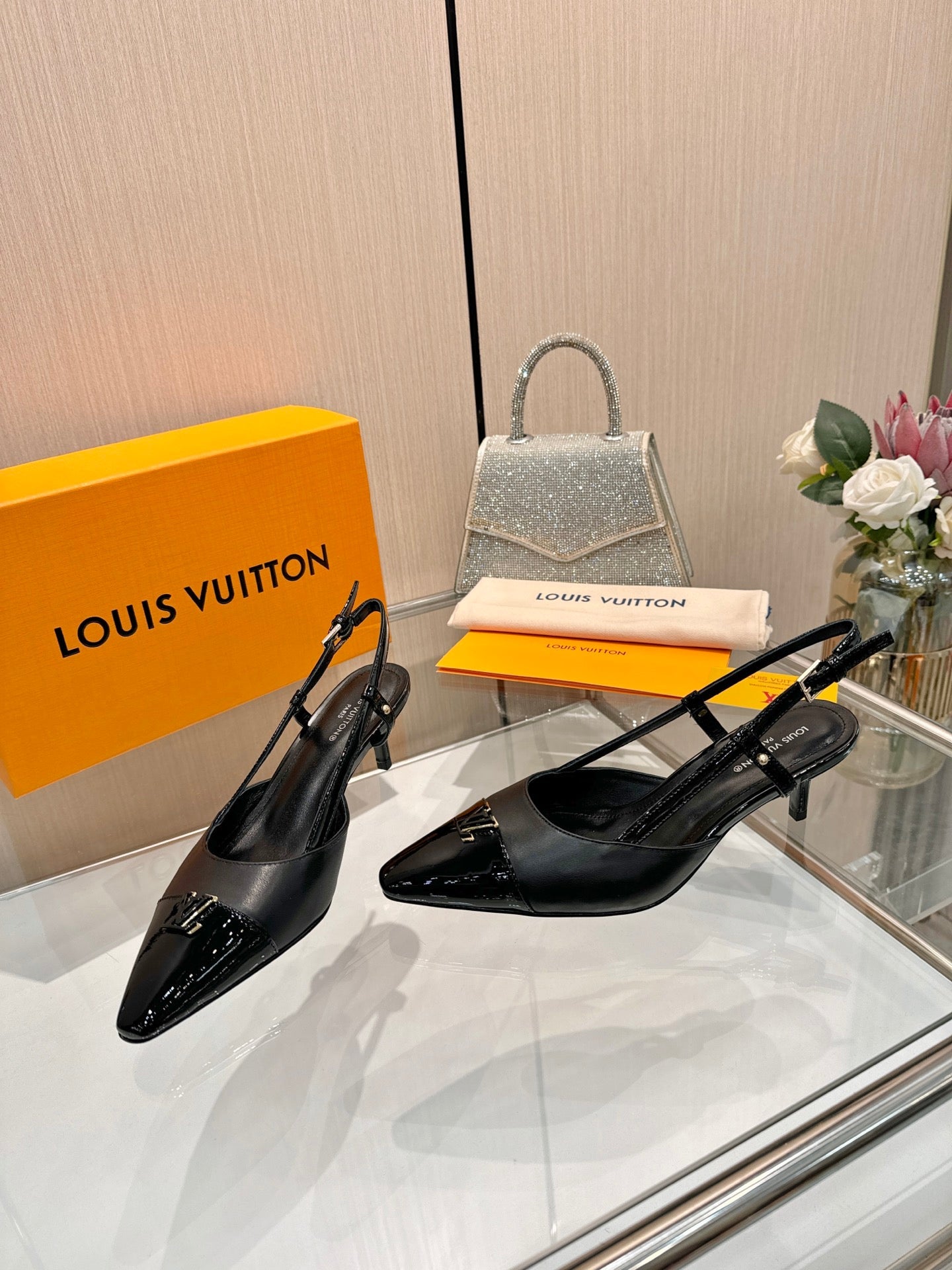 LV 26S SLINGBACK PUMPS 55 MM IN BLACK CALFSKIN