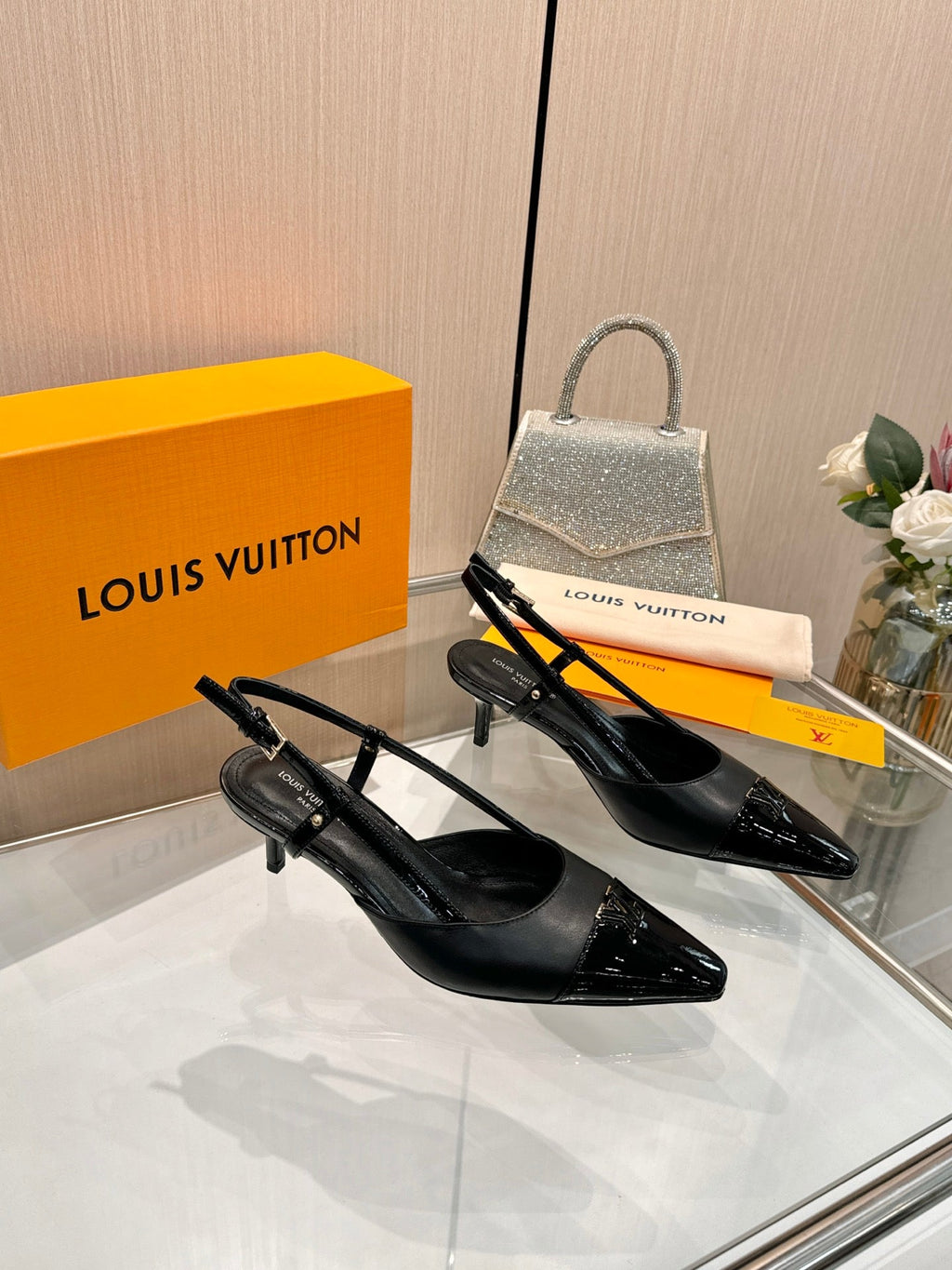 LV 26S SLINGBACK PUMPS 55 MM IN BLACK CALFSKIN