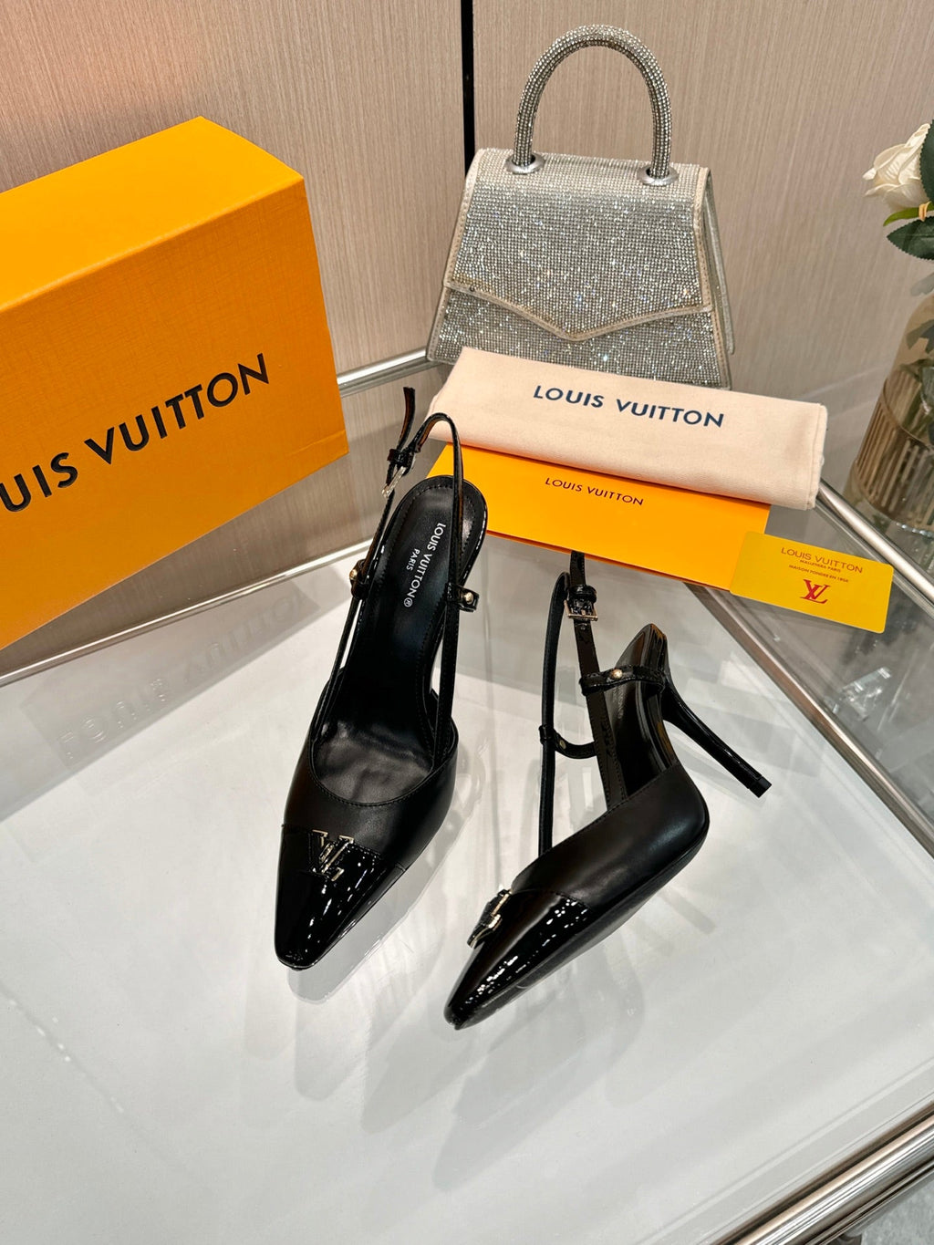 LV 26S SLINGBACK PUMPS 90 MM IN BLACK CALFSKIN