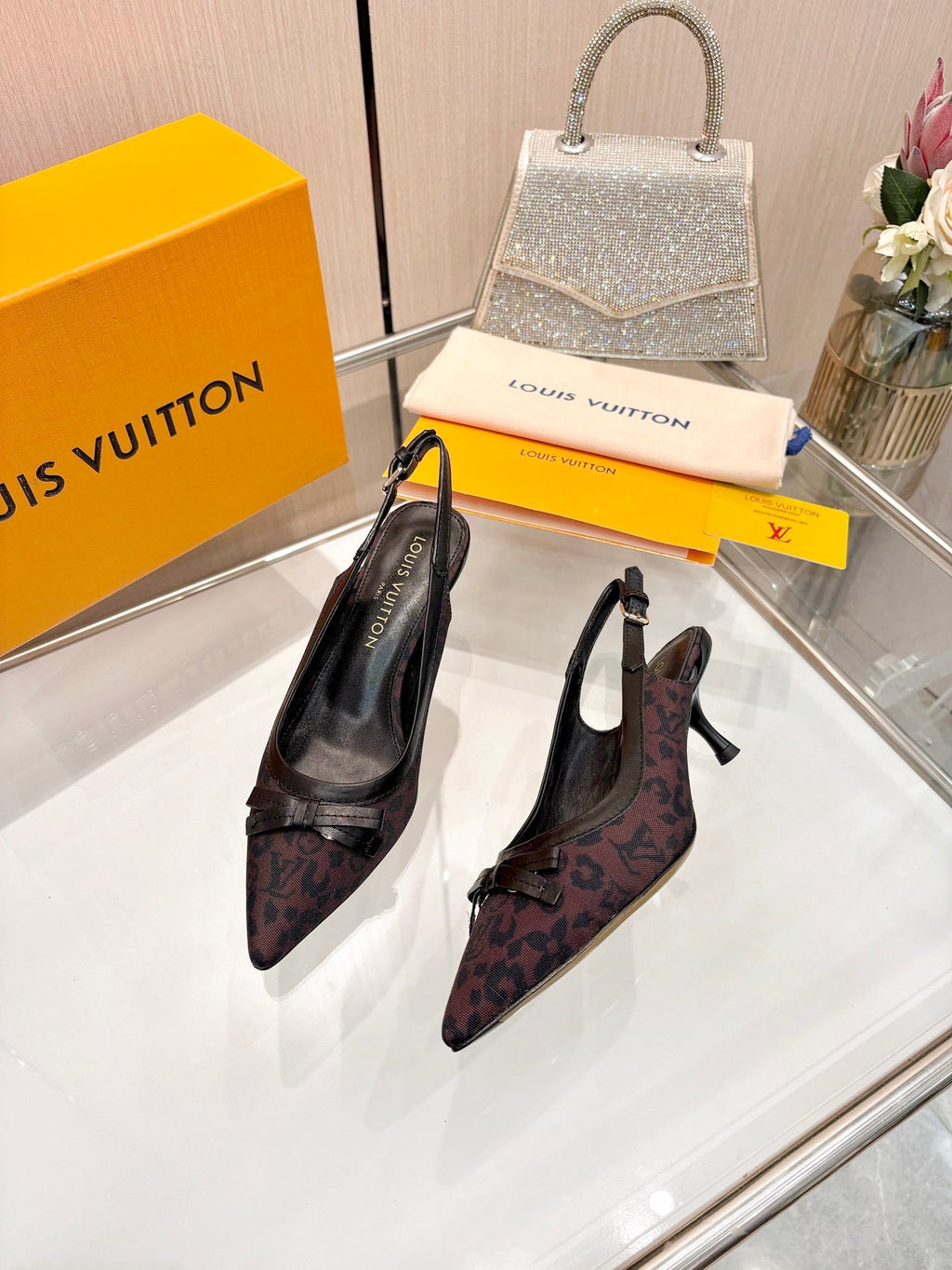 LV 26S BOW-DETAIL SLINGBACK PUMPS 55 MM IN MUTED PLUM BROWN MONOGRAM CANVAS