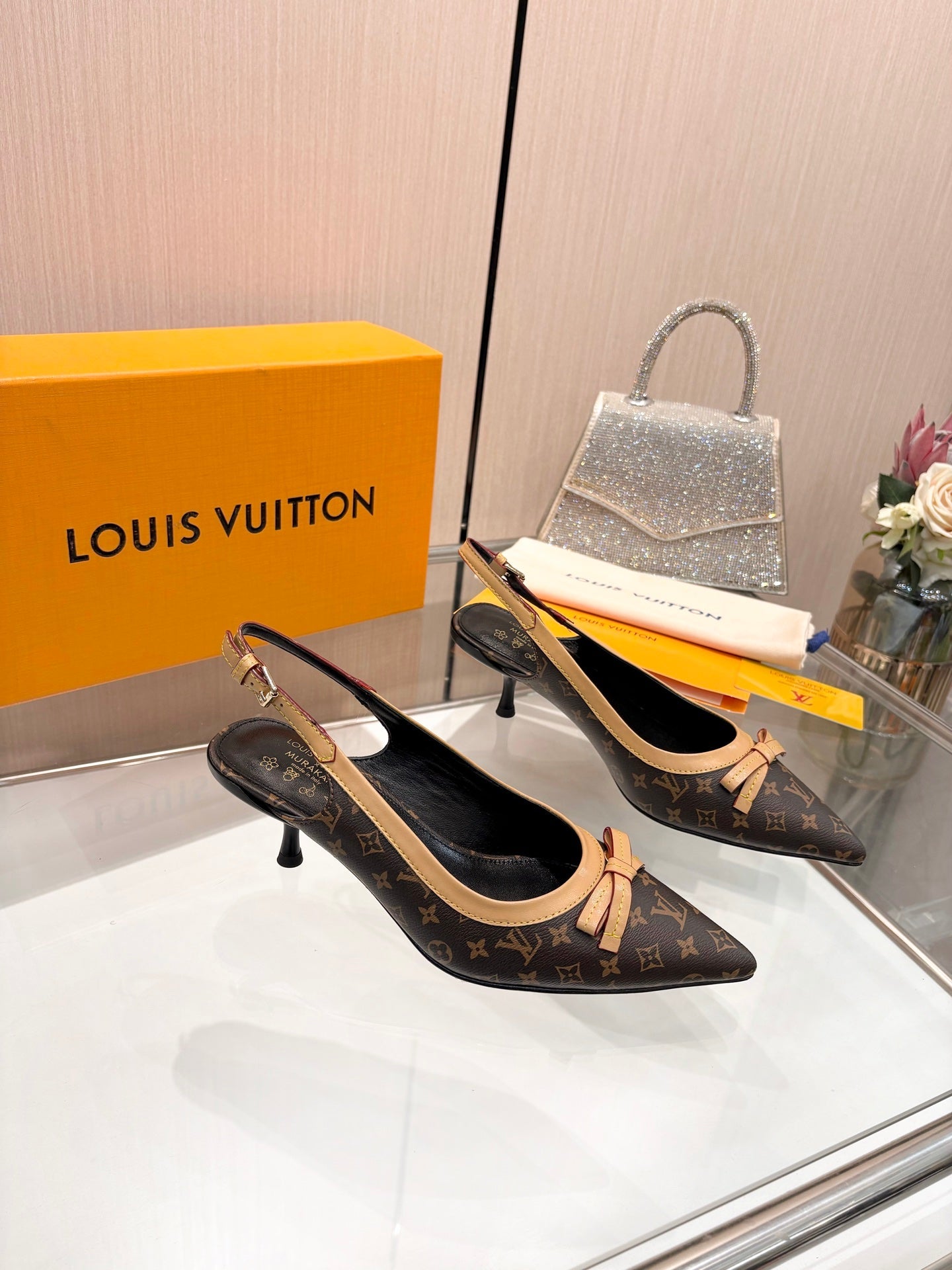 LV 26S BOW-DETAIL SLINGBACK PUMPS 55 MM IN DARK BROWN MONOGRAM CANVAS