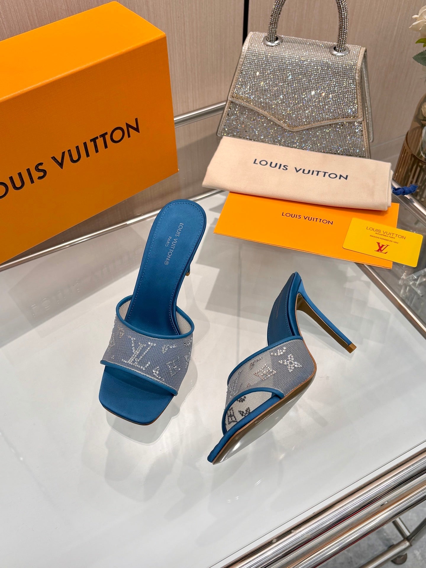 LV 26S MULE HEELS 90 MM IN OCEAN BLUE FABRIC AND LAMBSKIN