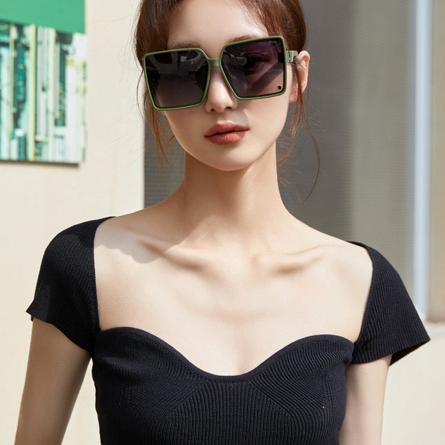 MONTAIGNE SUNGLASS CD1595 IN GREEN ACETATE