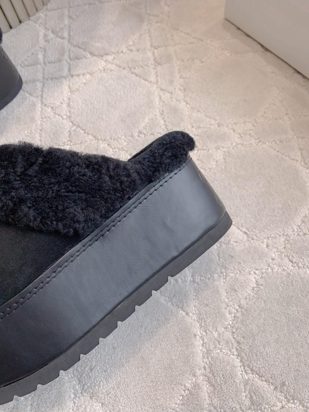 CELINE 25S DANA WEDGE MULE 70MM IN BLACK SUEDE CALFSKIN AND SHEARLING