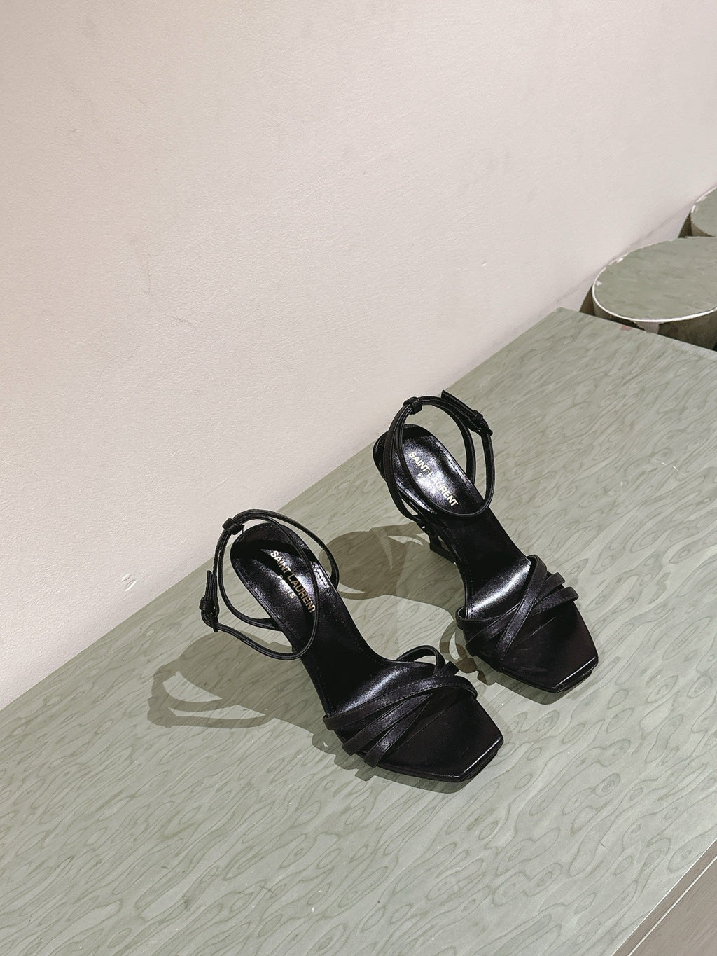 YSL 25S HIGH-HEEL SANDALS 100 MM IN BLACK LAMBSKIN WITH YSL LOGO HEEL DESIGN