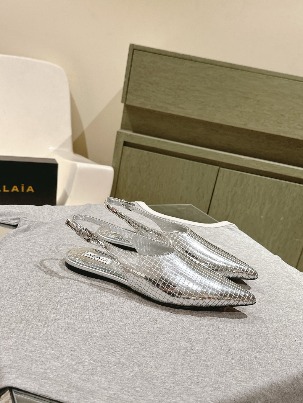 ALAIA SLINGBACK 25S IN SILVER PATENT LEATHER