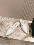 CC FLAT MULES 25S IN WHITE PATENT LEATHER