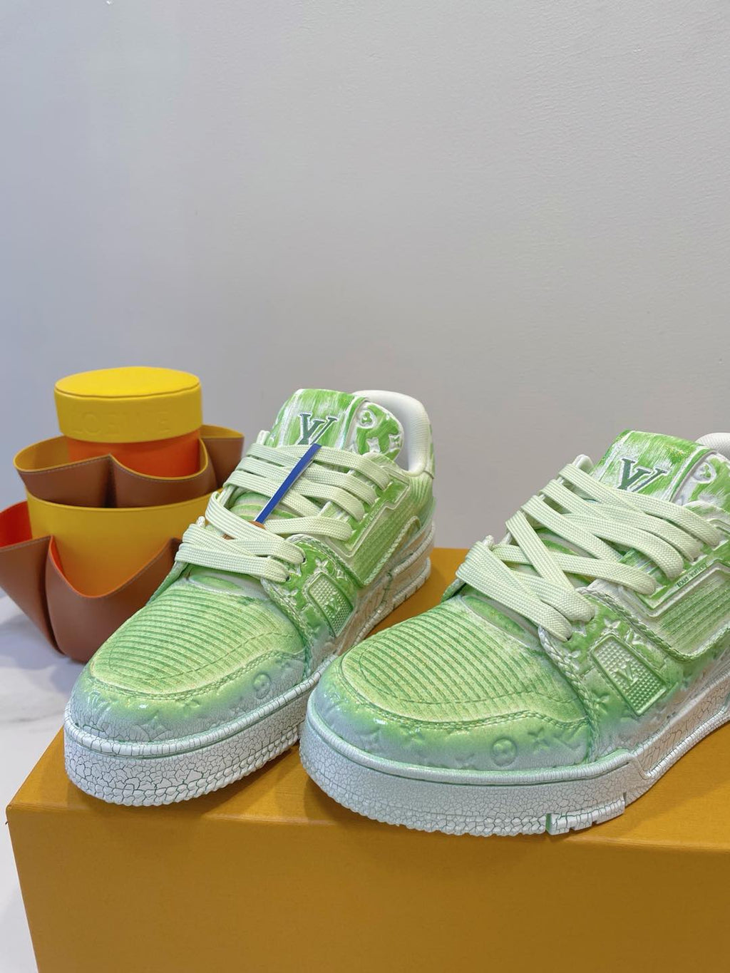 LV TRAINER MAXI SNEAKER IN GREEN PASTEL EMBOSSED CALFSKIN