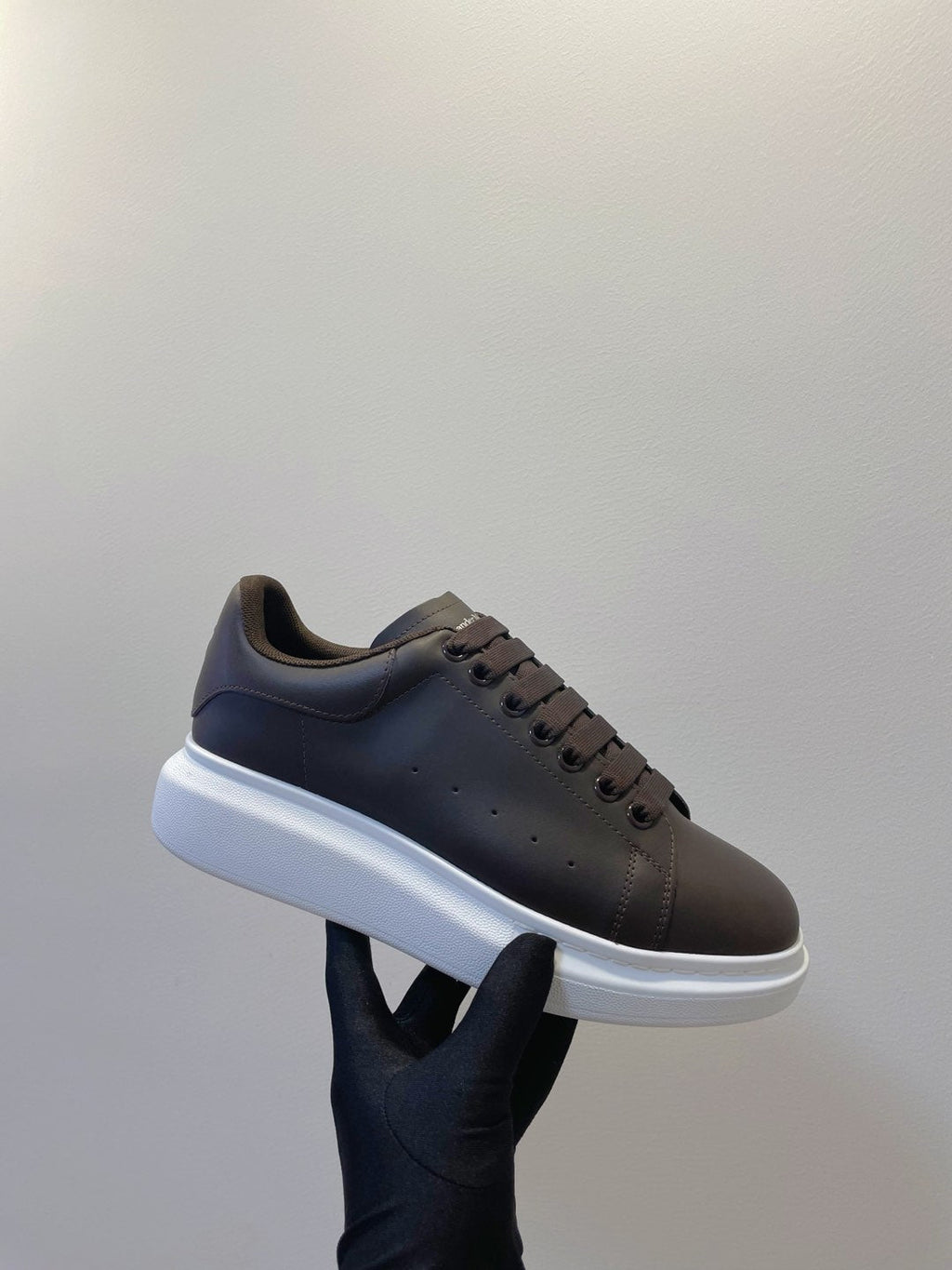 OVERSIZED SNEAKERS IN DARK BROWN SMOOTH CALFSKIN