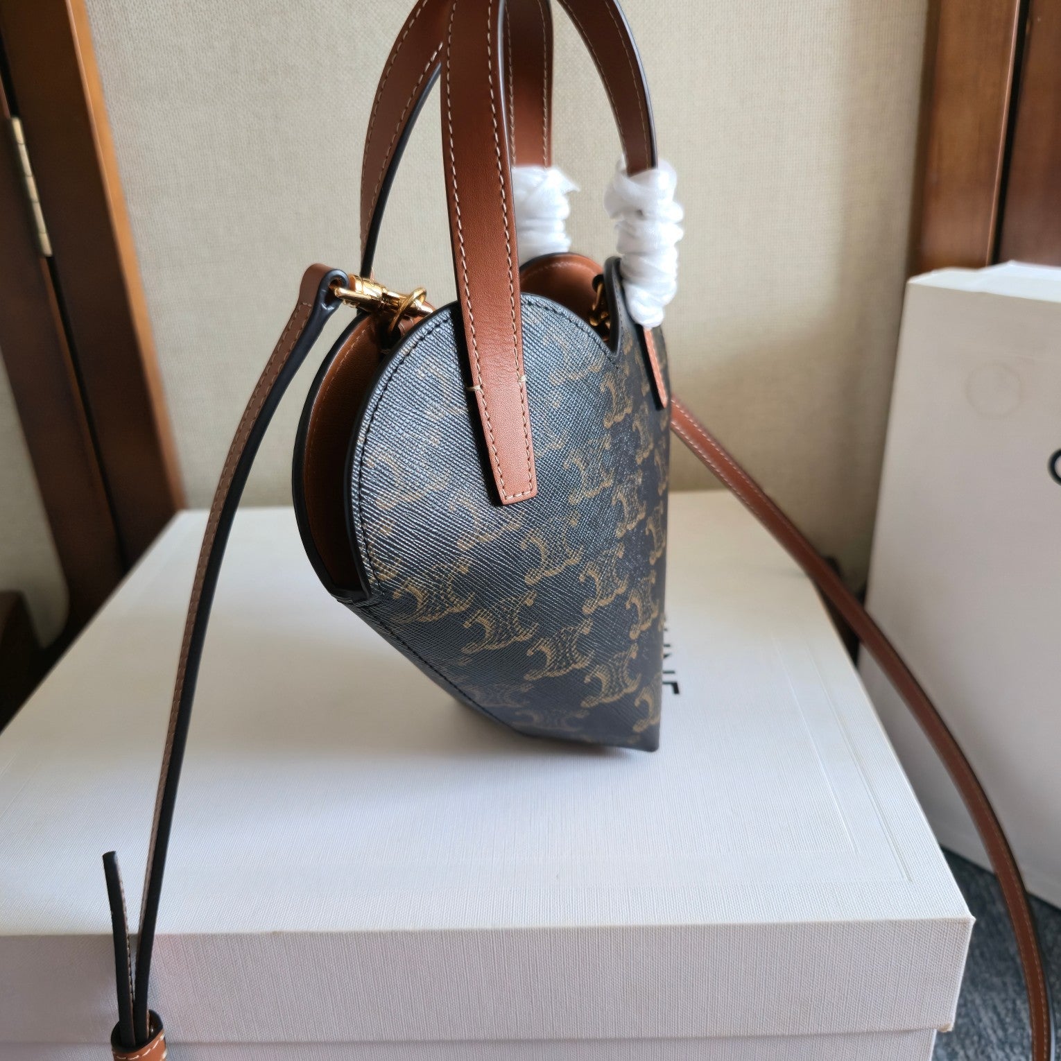 CELINE 25S TEEN COEUR BAG 19 MM IN BLACK TRIOMPHE CANVAS AND TAN CALFSKIN
