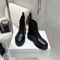 CELINE 26S CHUNKY-SOLE COMBAT BOOTS IN BLACK CALFSKIN