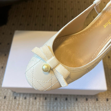DIOR 26S OPEN BACK SANDALS IN CREAM WHITE CALFSKIN WITH PEARL BOW