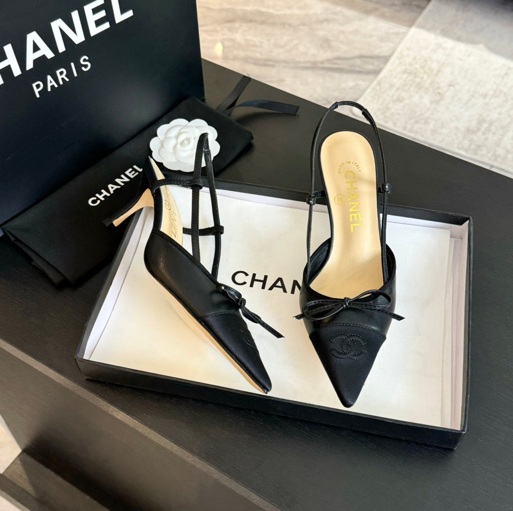 SLINGBACK WITH BOW IN BLACK LAMBSKIN
