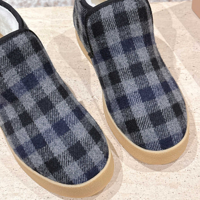 MIUMIU 25S SLIP-ON BOOTIES IN BLACK AND BLUE WOOL WITH SHEARLING