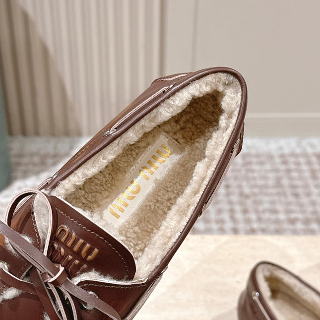 MIUMIU 25S BOAT SHOES IN SIENNA BROWN BLEACHED CALFSKIN WITH SHEARLING