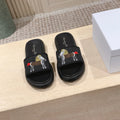 DIOR 26S SLIDE SANDALS IN BLACK MONOGRAM EMBROIDERED CANVAS
